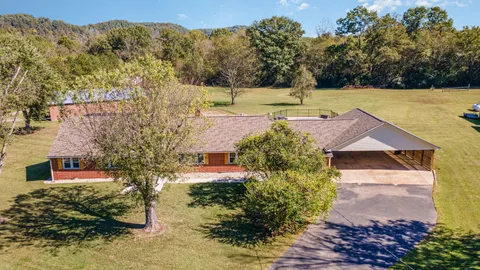 a view of a yard with an outdoor space
