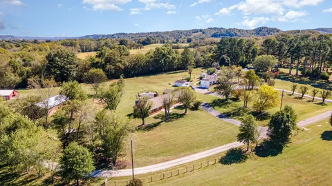 a aerial view of residential houses with outdoor space