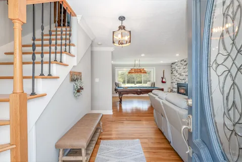 a living room with furniture and a table