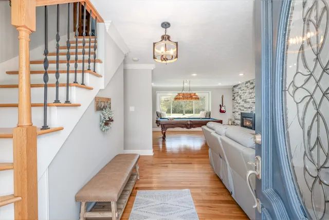 a living room with furniture and a table