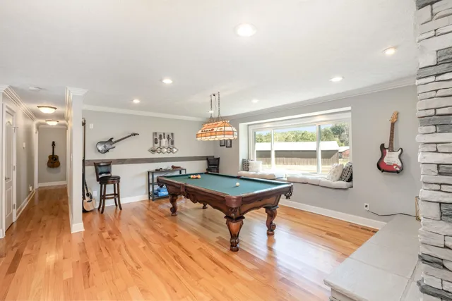 a room with furniture and wooden floor