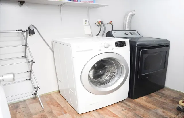 a utility room with dryer and washer