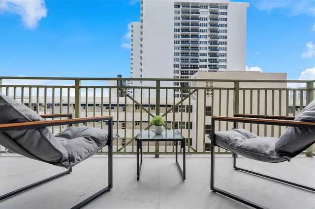 a balcony with furniture