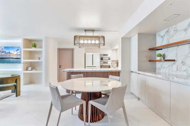 a view of a dining room with furniture