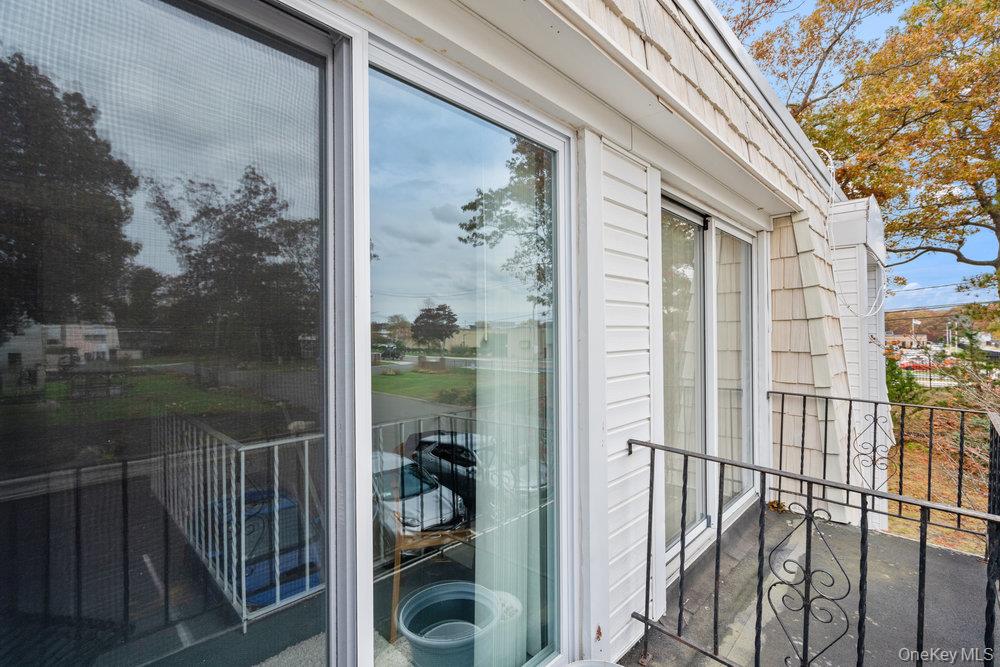 55 Rocky Point Yaphank Road, Unit 38 Rocky Point, NY 11764 - Photo 23 of 25 a view of a balcony