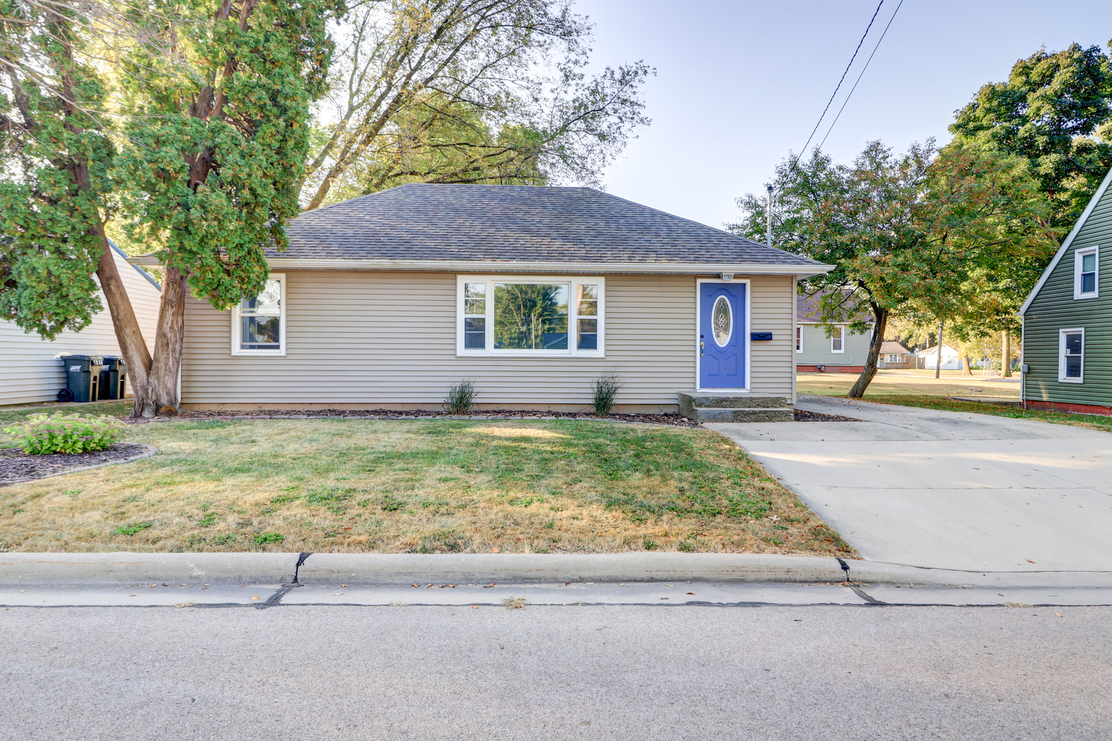 1013 West 8th Street Sterling, IL 61081 - Photo 1 of 22 a front view of a house with garden