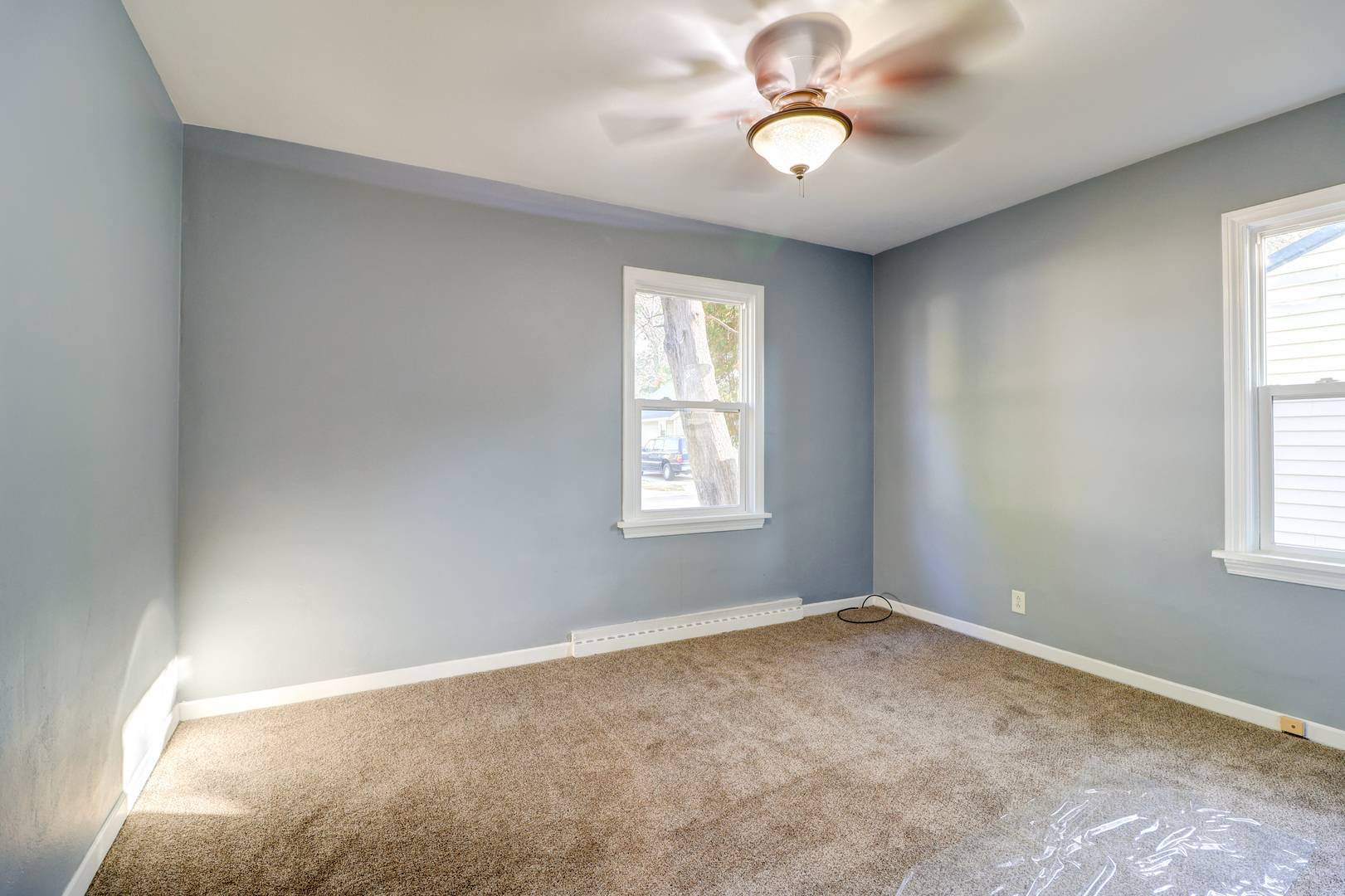 1013 West 8th Street Sterling, IL 61081 - Photo 11 of 22 a view of an empty room with a window