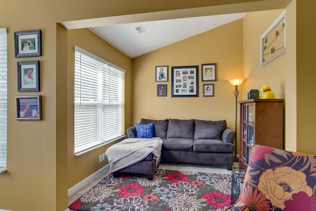4029 Williford Way Spring Hill, TN 37174 - Photo 13 of 22 a living room with furniture and a window