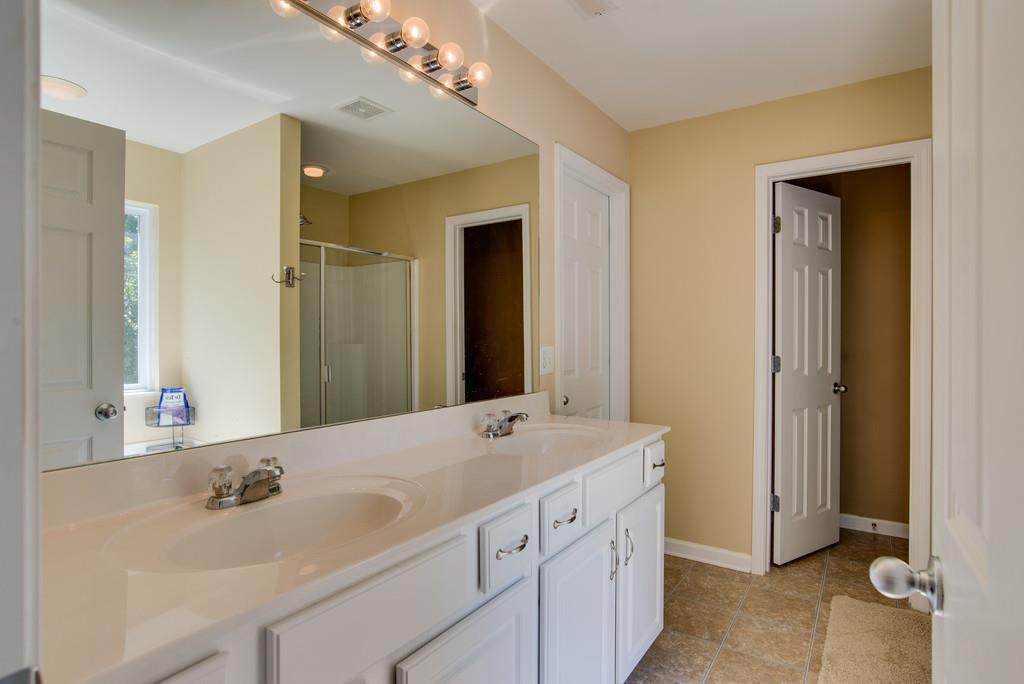 4029 Williford Way Spring Hill, TN 37174 - Photo 14 of 22 a bathroom with a sink and a mirror
