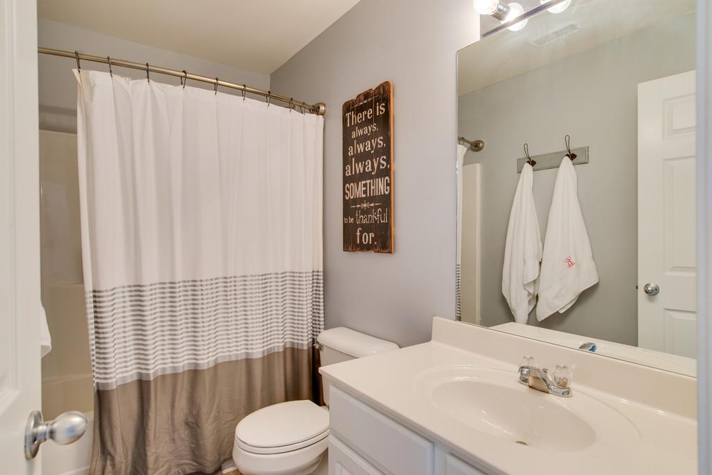 4029 Williford Way Spring Hill, TN 37174 - Photo 16 of 22 a bathroom with a sink toilet and shower