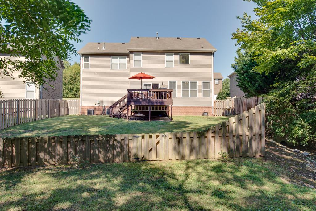 4029 Williford Way Spring Hill, TN 37174 - Photo 19 of 22 a view of a house with a yard