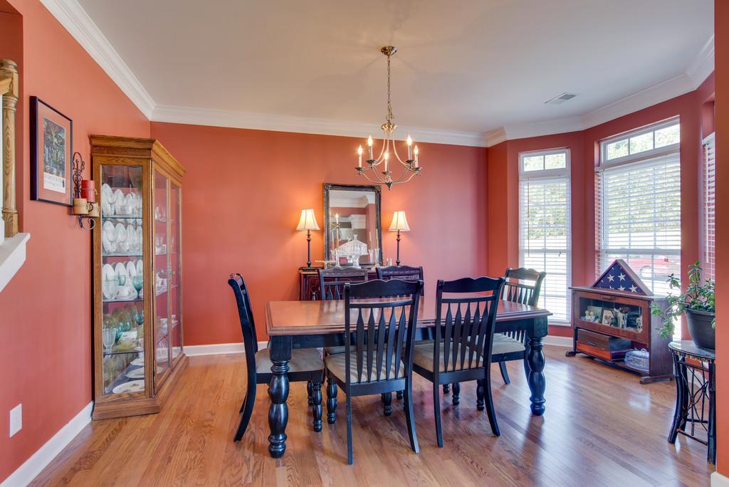 4029 Williford Way Spring Hill, TN 37174 - Photo 4 of 22 a view of a dining room with furniture window and wooden floor