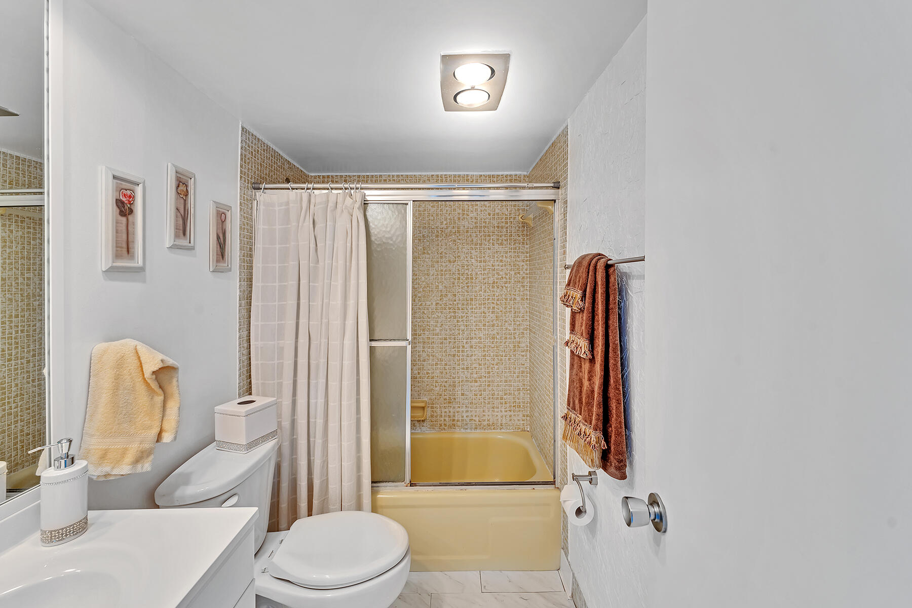 3091 North Course Drive, Unit 108 Pompano Beach, FL 33069 - Photo 30 of 42 a bathroom with a toilet and shower