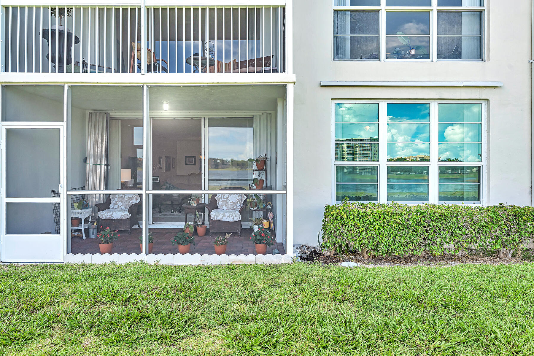 3091 North Course Drive, Unit 108 Pompano Beach, FL 33069 - Photo 35 of 42 a view of outdoor space yard and balcony