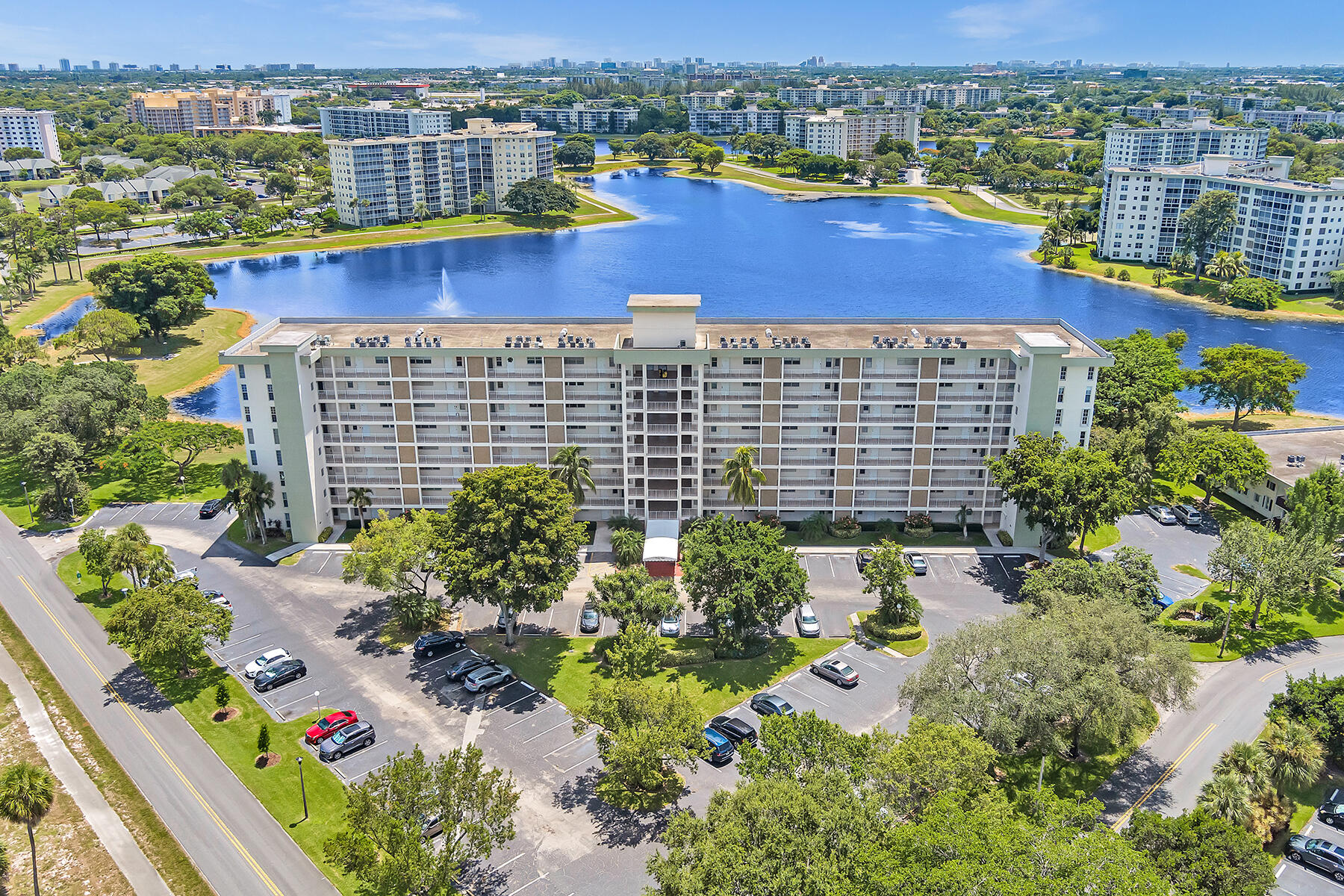 3091 North Course Drive, Unit 108 Pompano Beach, FL 33069 - Photo 40 of 42 a view of a city with tall buildings