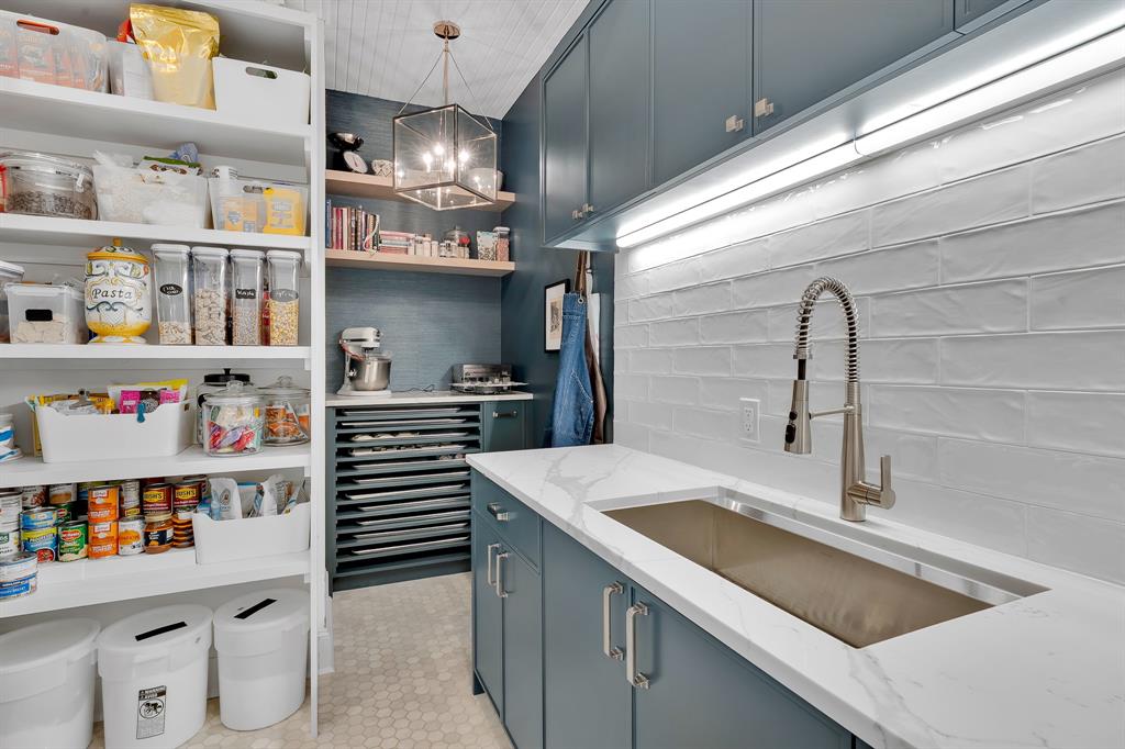 1431 Travis Circle North Irving, TX 75038 - Photo 15 of 40 a kitchen with a refrigerator and a sink