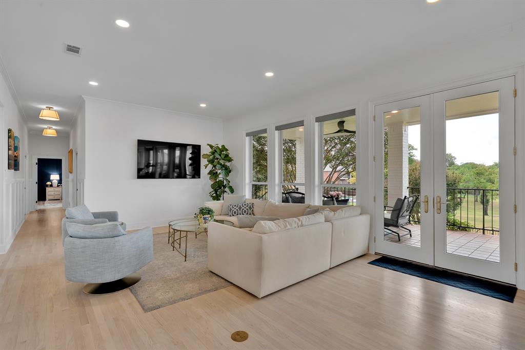 1431 Travis Circle North Irving, TX 75038 - Photo 16 of 40 a living room with furniture and large windows