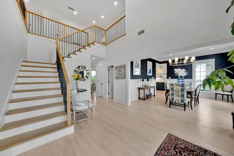 a view of entryway livingroom and hall