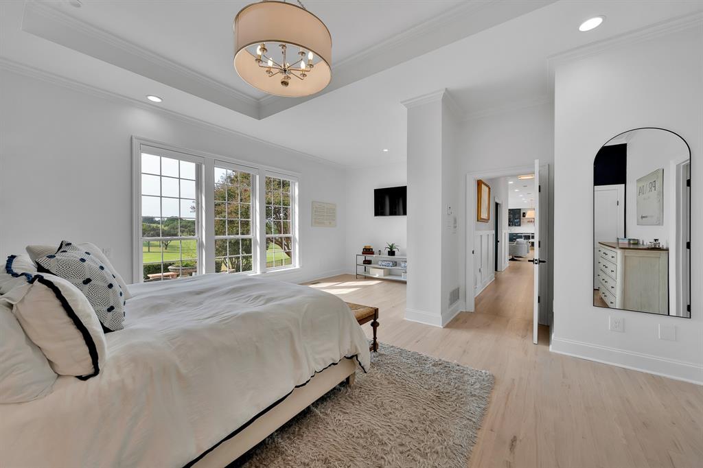 1431 Travis Circle North Irving, TX 75038 - Photo 27 of 40 a bed room with a bed mirror and a window