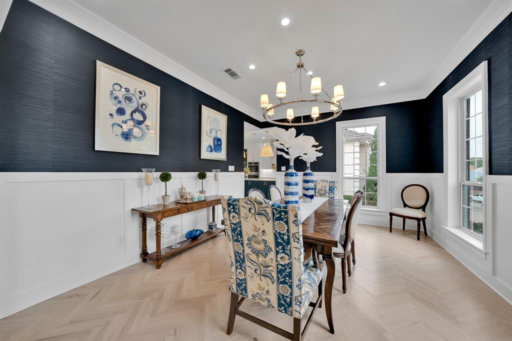 1431 Travis Circle North Irving, TX 75038 - Photo 7 of 40 a view of a dining room with furniture and a chandelier