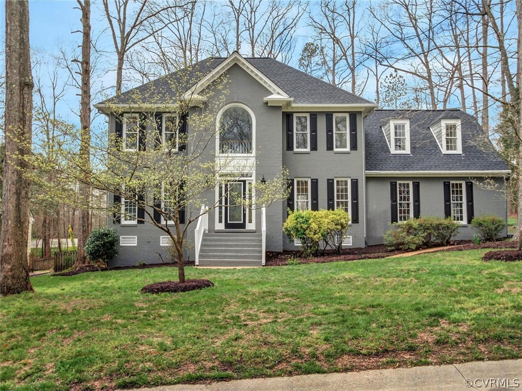 6000 Sedgefield Road Midlothian, VA 23112 - Photo 1 of 36 a front view of a house with a yard