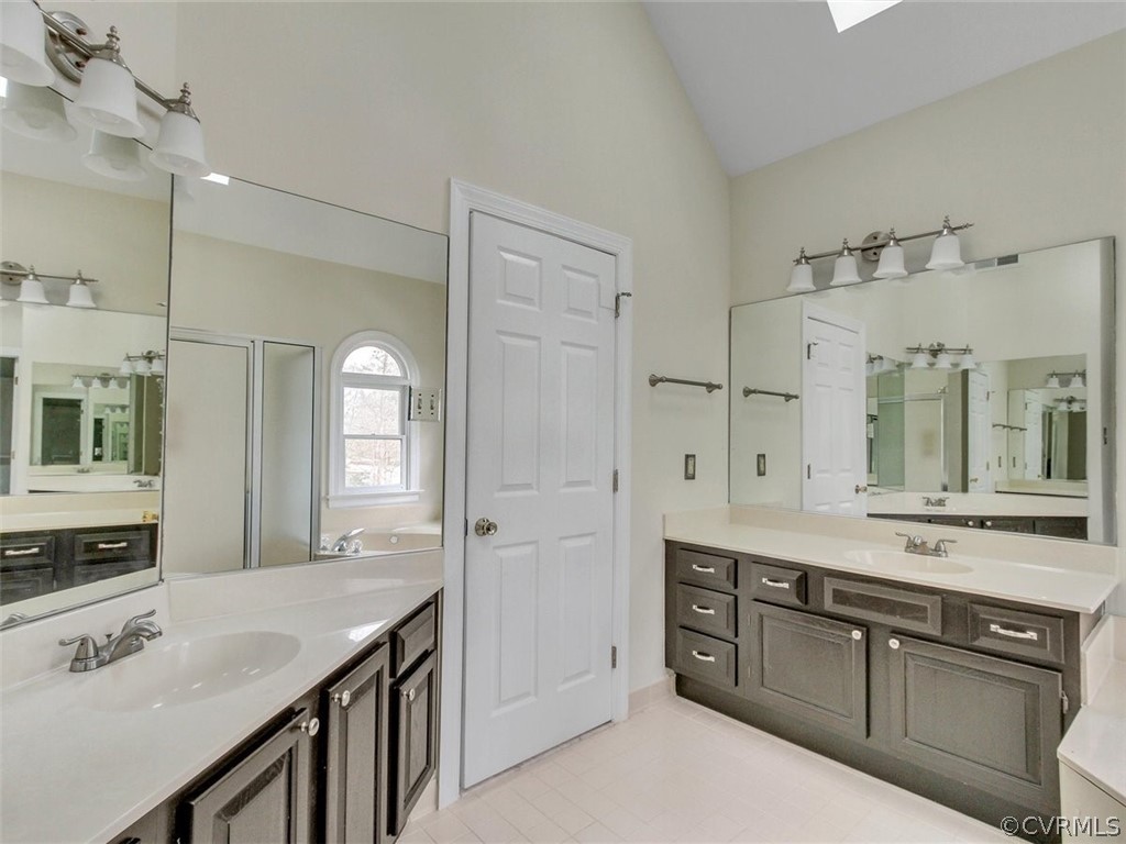 6000 Sedgefield Road Midlothian, VA 23112 - Photo 24 of 36 a spacious bathroom with a granite countertop sink mirror and double