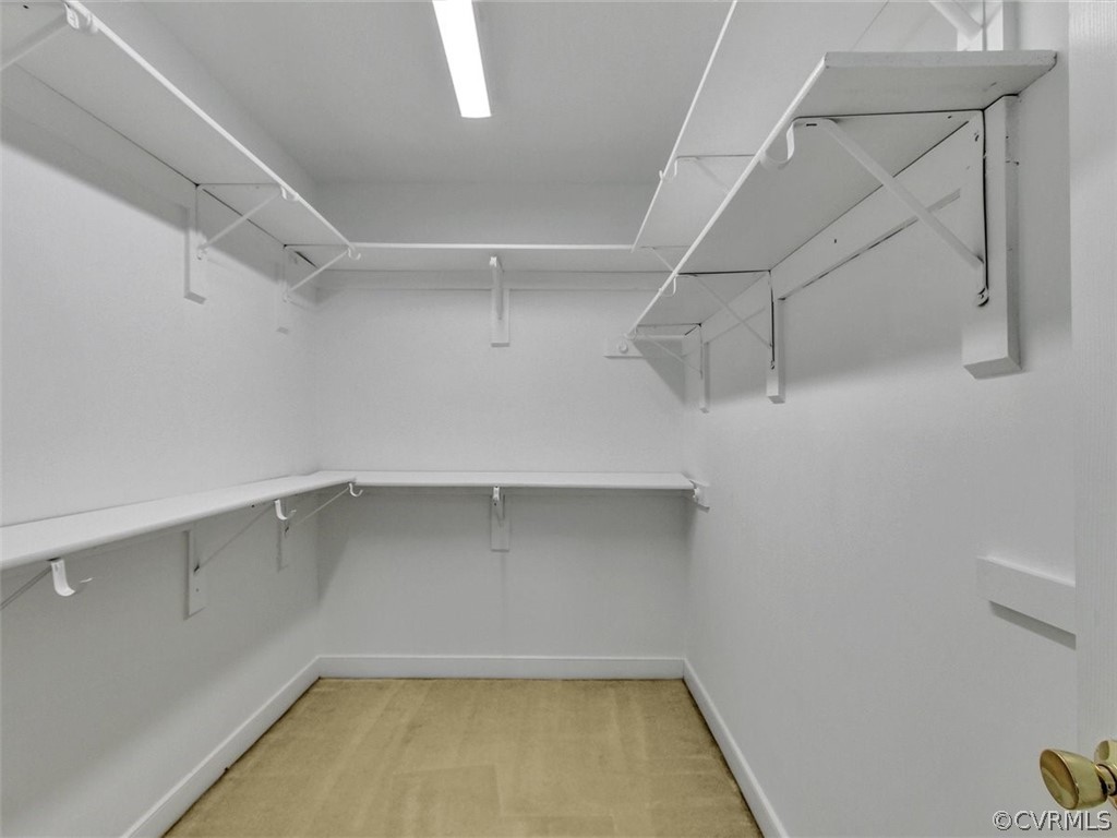 6000 Sedgefield Road Midlothian, VA 23112 - Photo 26 of 36 a view of a room with racks on the wall