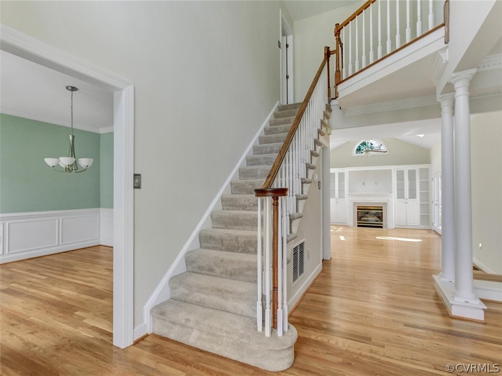 6000 Sedgefield Road Midlothian, VA 23112 - Photo 4 of 36 a view of an entryway with wooden floor and staircase