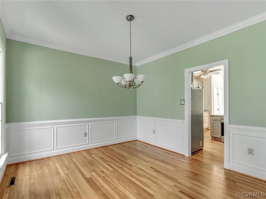 6000 Sedgefield Road Midlothian, VA 23112 - Photo 6 of 36 a view of a room with wooden floor closet and a ceiling fan