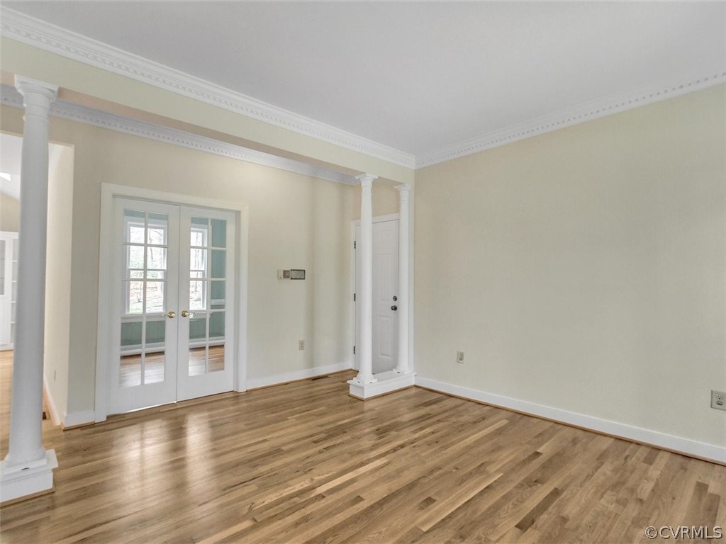 6000 Sedgefield Road Midlothian, VA 23112 - Photo 9 of 36 an empty room with wooden floor and windows