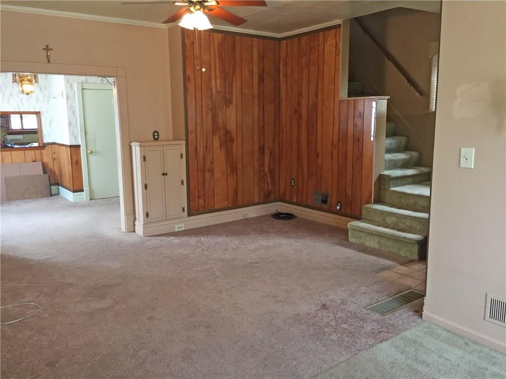 535 Columbia Street Sharon, PA 16146 - Photo 7 of 15 Living Room and stairs to second floor.