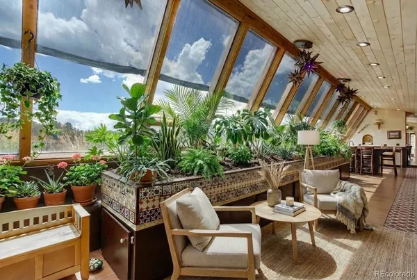 a outdoor living space with furniture and garden view