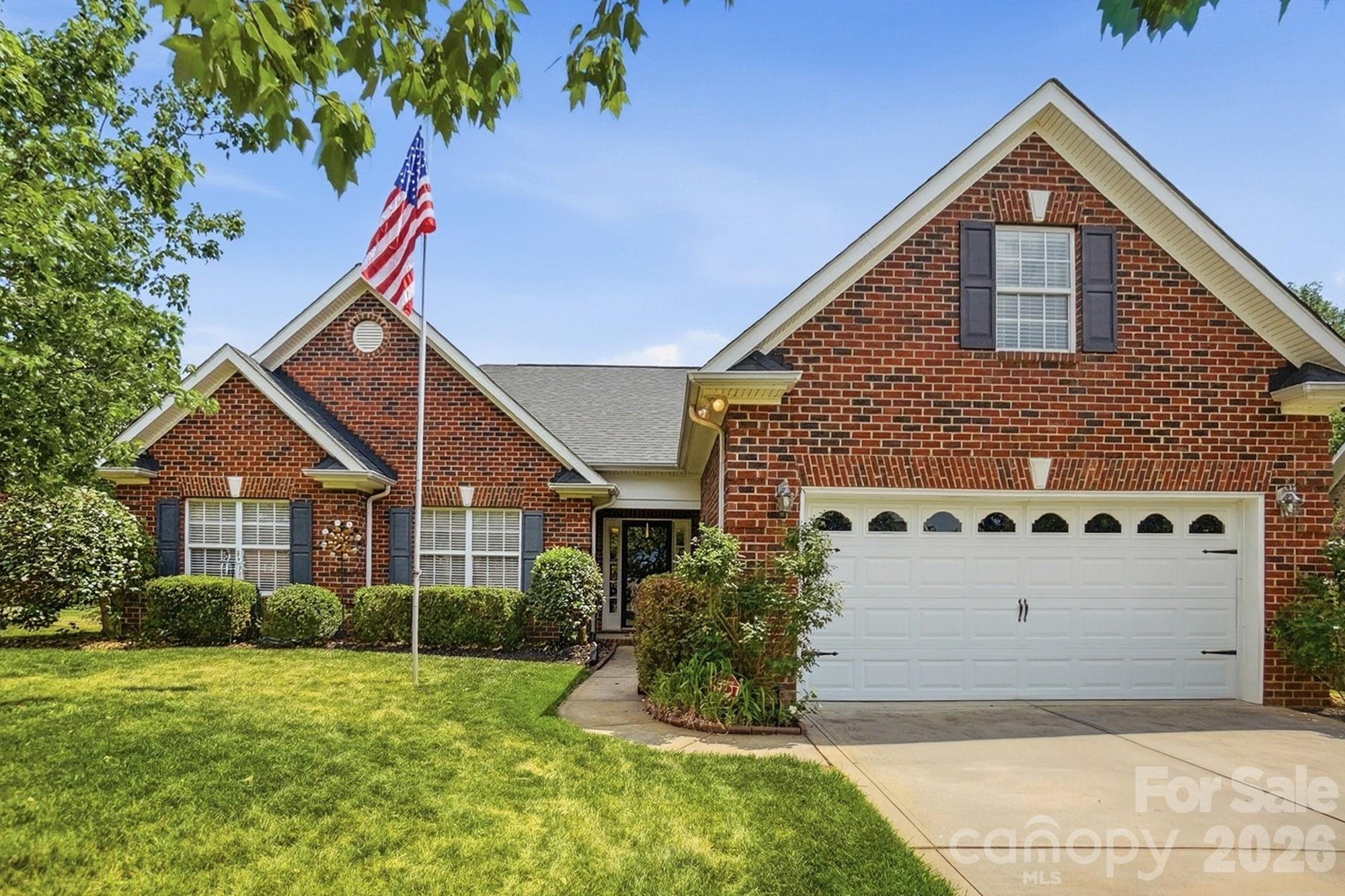 3324 Muddy Creek Road Midland, NC 28107 - Photo 2 of 46 a front view of a house with a yard