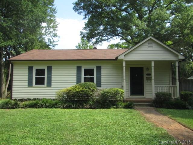 1458 Cortland Road West Charlotte, NC 28209 - Photo 1 of 9 a front view of a house with yard and green space