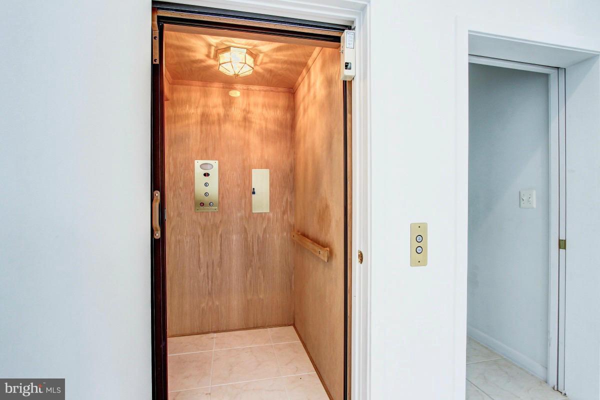 2927 Cox Neck Road East Chester, MD 21619 - Photo 24 of 30 Dual entrance elevator (LR or garage access)