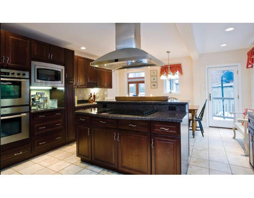 22 Salisbury Road Brookline, MA 02445 - Photo 6 of 7 a kitchen with a sink cabinets and stainless steel appliances