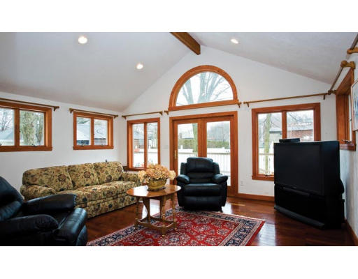 22 Salisbury Road Brookline, MA 02445 - Photo 7 of 7 a living room with furniture and a large window