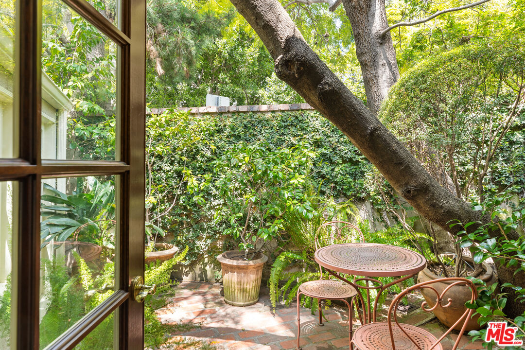 2383 Mandeville Canyon Road Los Angeles, CA 90049 - Photo 30 of 51 a outdoor view with a seating space