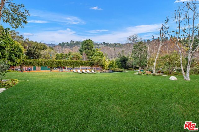 a view of a golf course with a lake