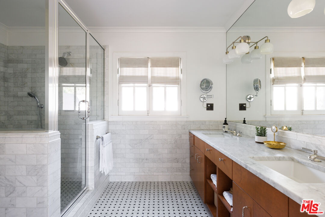 4207 Dundee Drive Los Angeles, CA 90027 - Photo 26 of 33 a bathroom with a double vanity sink mirror and shower