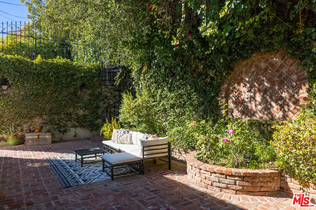 4207 Dundee Drive Los Angeles, CA 90027 - Photo 31 of 33 a view of a backyard with sitting area