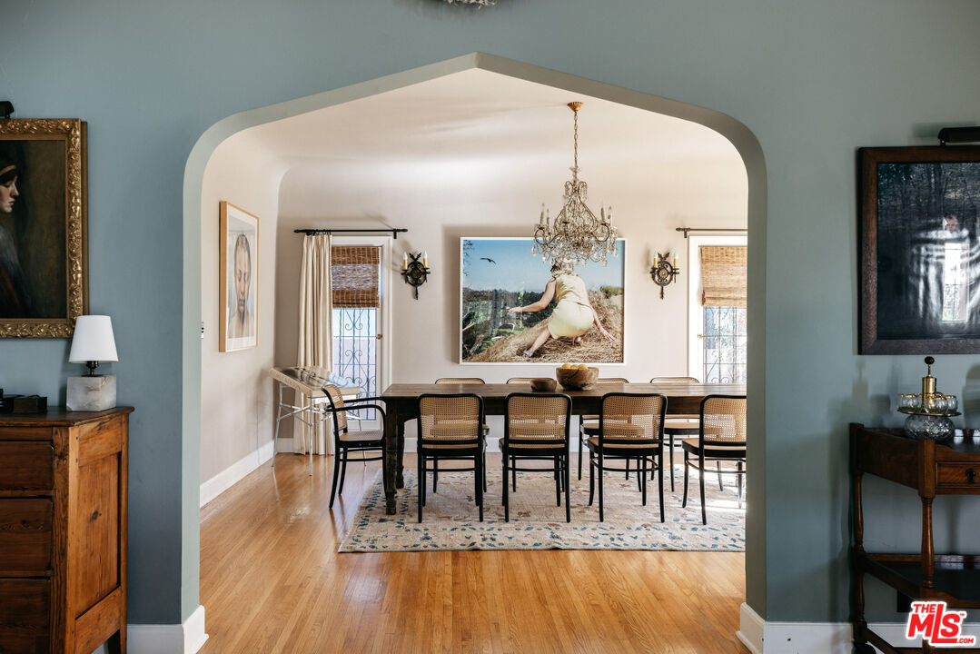 4207 Dundee Drive Los Angeles, CA 90027 - Photo 9 of 33 a view of a dining room with furniture window and wooden floor