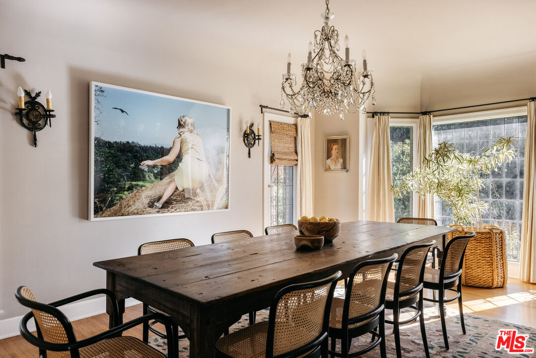 4207 Dundee Drive Los Angeles, CA 90027 - Photo 10 of 33 a view of a dining room with furniture window and outside view