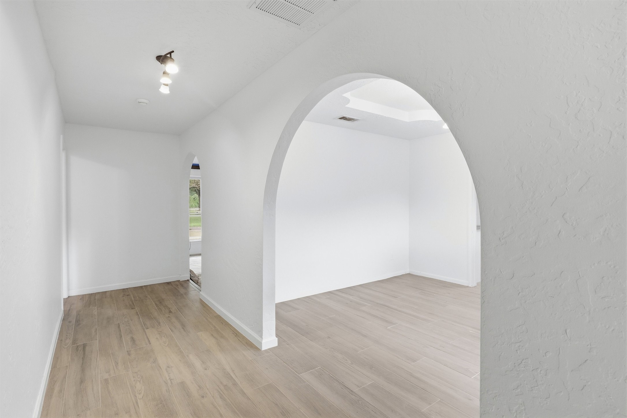 22923 Tomball Cemetery Road Tomball, TX 77377 - Photo 50 of 50 Welcome in to this gorgeous home with beautiful arches, wood tile floors, and spacious floor plan.