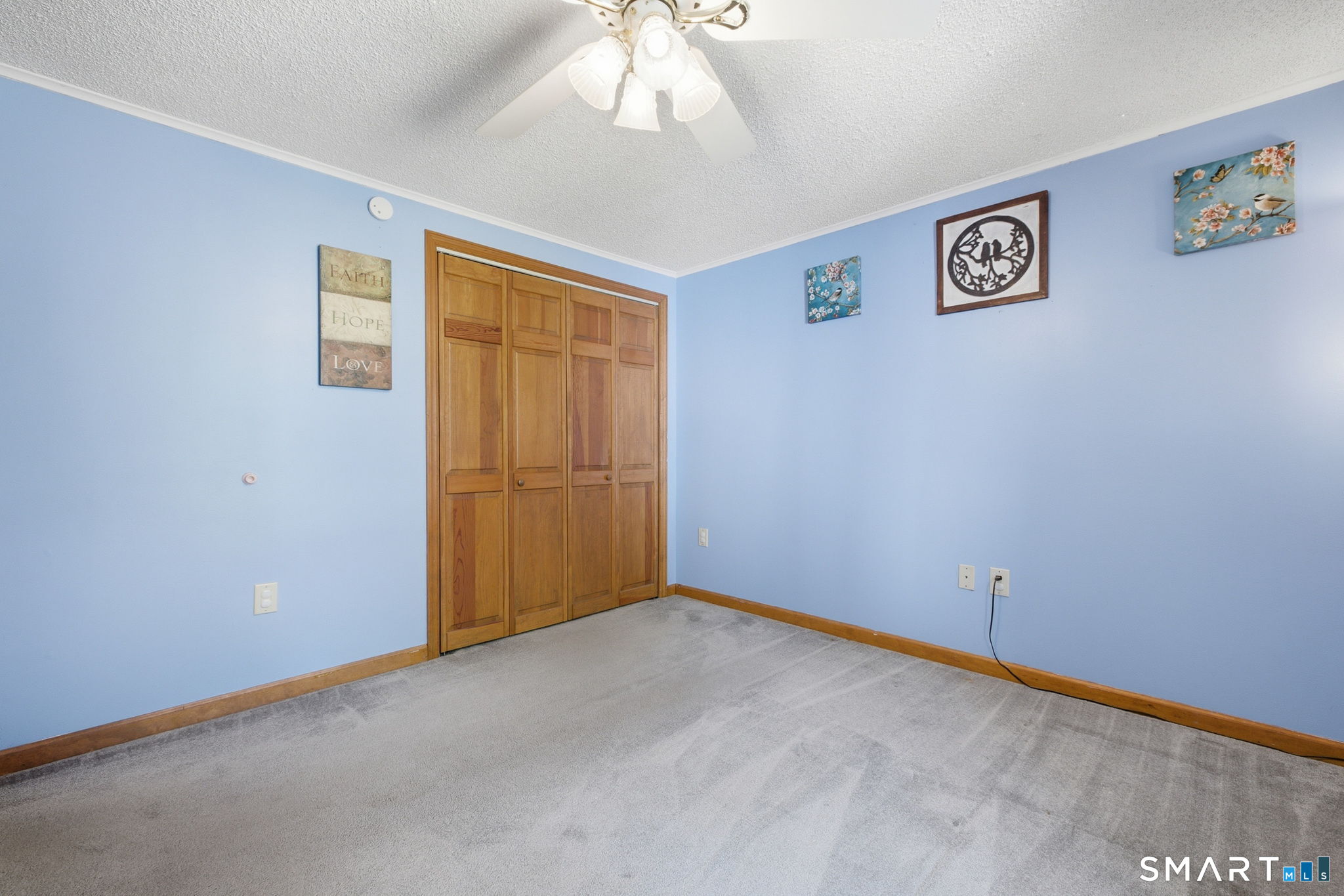 141 Hop River Road Coventry, CT 06238 - Photo 16 of 40 an empty room with windows