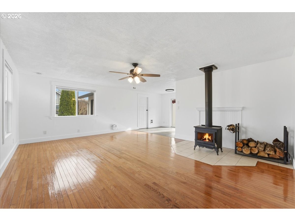 369 South 16th Avenue Cornelius, OR 97113 - Photo 13 of 29 a view of empty room with wooden floor