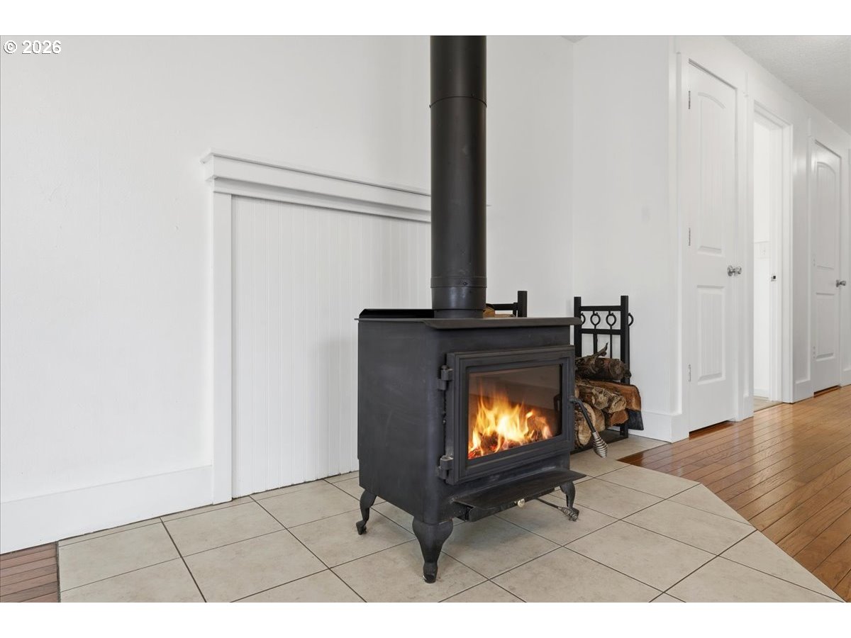 369 South 16th Avenue Cornelius, OR 97113 - Photo 14 of 29 a living room with furniture and a fireplace