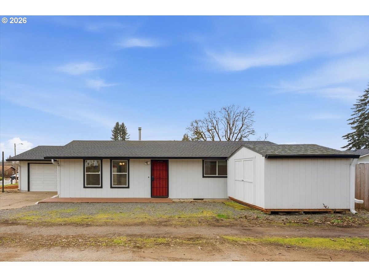 369 South 16th Avenue Cornelius, OR 97113 - Photo 2 of 29 a front view of a house with a garden