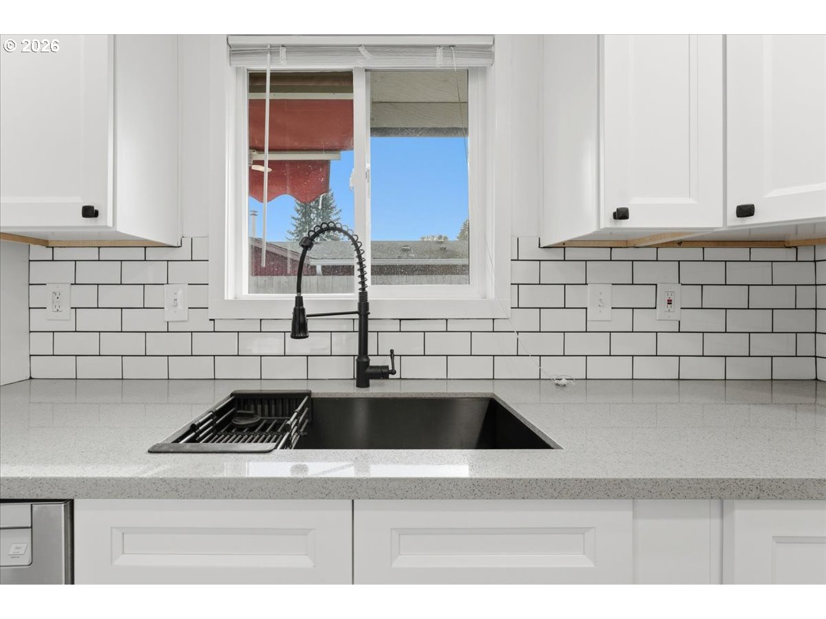 369 South 16th Avenue Cornelius, OR 97113 - Photo 27 of 29 a kitchen with a sink and cabinets