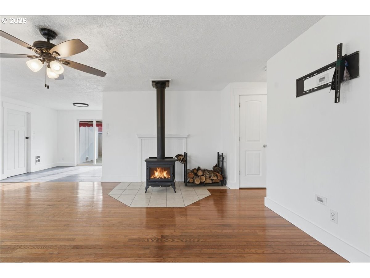 369 South 16th Avenue Cornelius, OR 97113 - Photo 10 of 29 a view of empty room with wooden floor